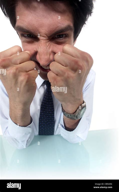 Frustrated Businessman Clenching His Fists Stock Photo Alamy