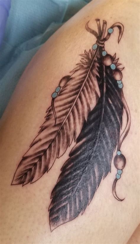 Feather Tattoo In 2021 Indian Feather Tattoos Feather Tattoo Tattoos