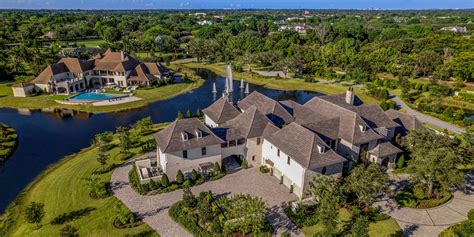 Side By Side Florida Mansions Built For Identical Twins Ask 54 Million The Daily Cable Co