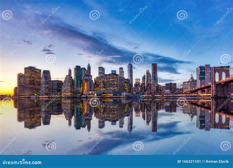New York City Lower Manhattan With Brooklyn Bridge At Dusk View From