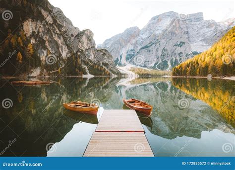 Traditional Rowing Boats At Lago Di Braies In The Alps In Fall Stock