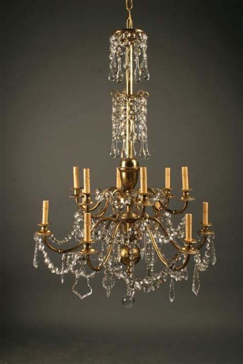 Antique French Arm Brass And Crystal Chandelier