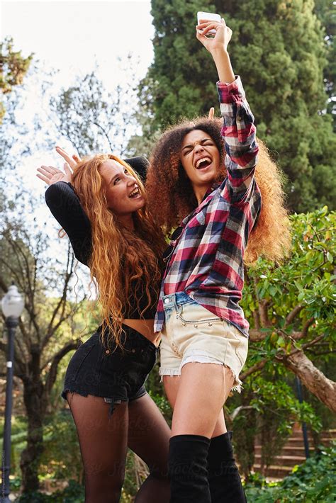 Girls Taking Funny Selfie By Stocksy Contributor Guille Faingold