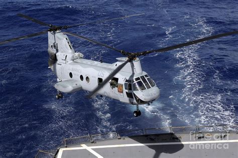 A Ch 46 Sea Knight Helicopter Lands Photograph By Stocktrek Images