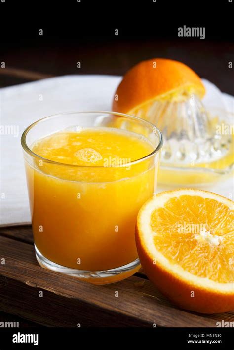 A Glass Of Freshly Squeezed Orange Juice Stock Photo Alamy