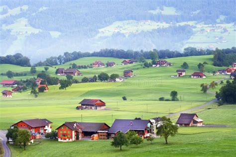 Beautiful Houses In The Swiss Mountain Valley At Dawn Stock Image