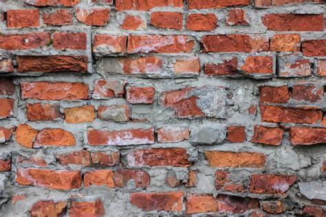 Old Damaged Red Brick Wall With Cement Joints Texture Background