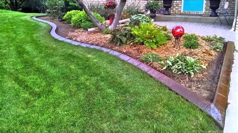 Dressing up your lawn edging can give your outdoor space a newer and cleaner look. Concrete Landscape Edging by Curb Creations - 2014 - YouTube