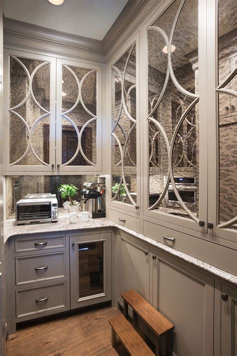 Check out our kitchen sinks. A new residence by Murphy & Co. Design. | Mirrored kitchen ...