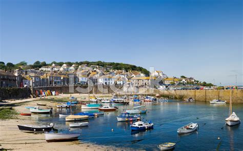 Mousehole Village And Harbour In Cornwall Uk Fishing Village Stock