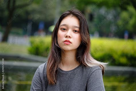 Portrait Of Chinese Teenager Asian Appearance Calm Sad Face Cute