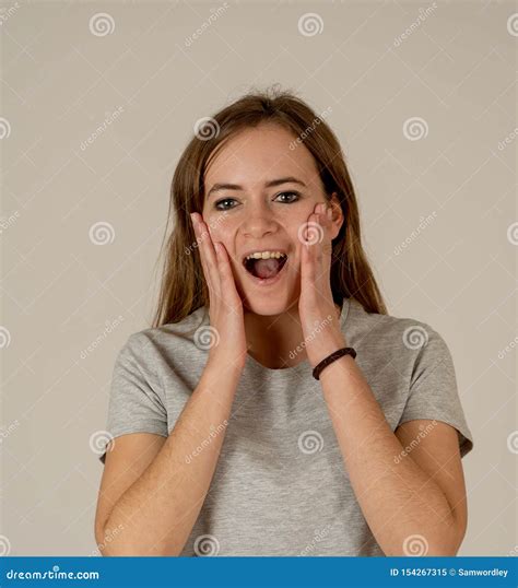 Close Up Portrait Of Surprised And Happy Teenager Girl In Facial