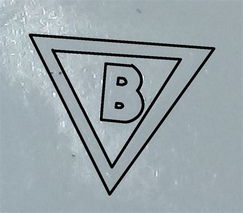 What Is This Symbol B Inside Upside Down Triangle Under