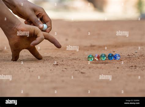 Playing Marbles Hi Res Stock Photography And Images Alamy