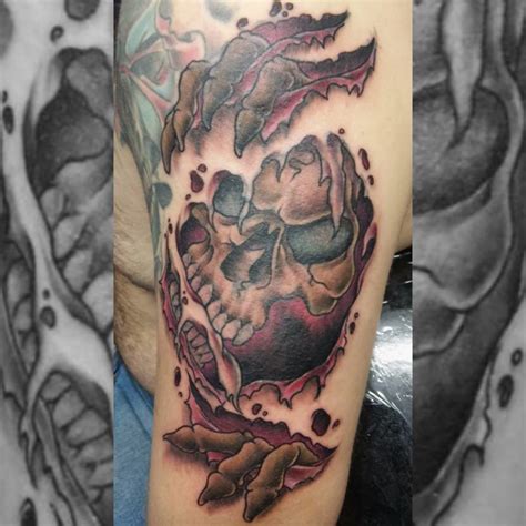 Skull Ripping Through Skin Tattoo By Lil Billy Cool Tattoos Skull