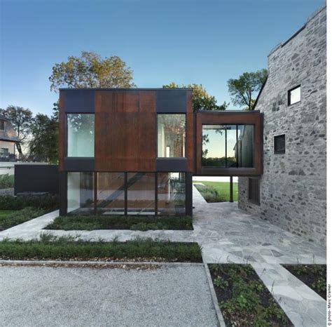 Contemporary Addition Enhancing Old Stone House Design