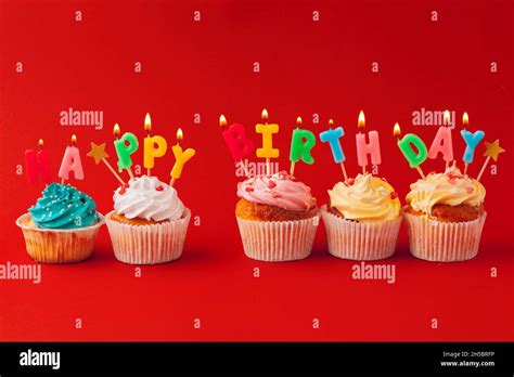 Happy Birthday Cupcakes On Bright Colored Background Stock Photo Alamy