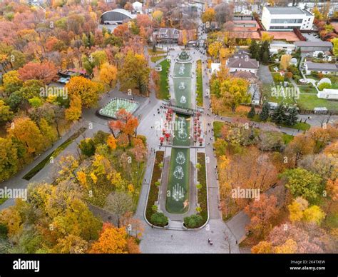 Aerial View On Vibrant Autumn Shevchenko City Garden With Fountains