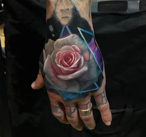 Red rose tattoos red rose is always been a symbol of eternal affection and desire, it is used by lovers to express their deepest thoughts of love and adoration, for their beloved. Rose Hand Tattoo, Realistic Pink & White Flower | Best ...