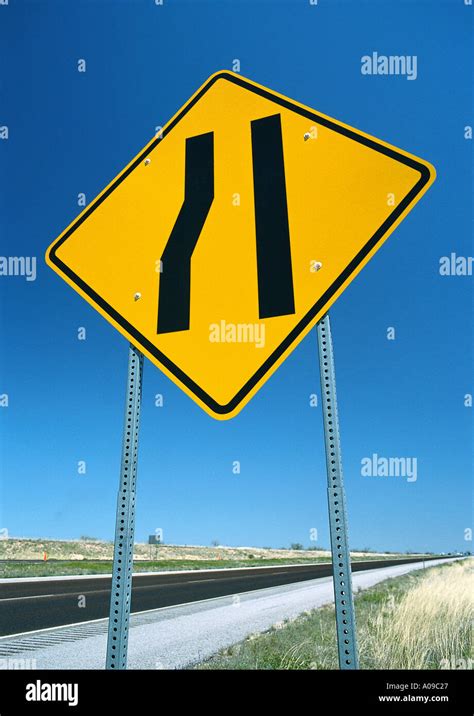 Yellow And Black Diamond Shaped Merge Road Sign Stock Photo Alamy