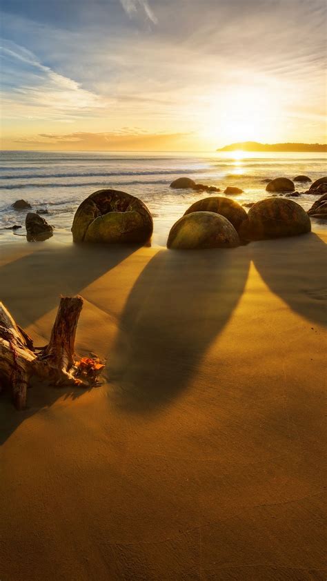 Download Wallpaper 1350x2400 New Zealand Ocean Sunrise Rocks