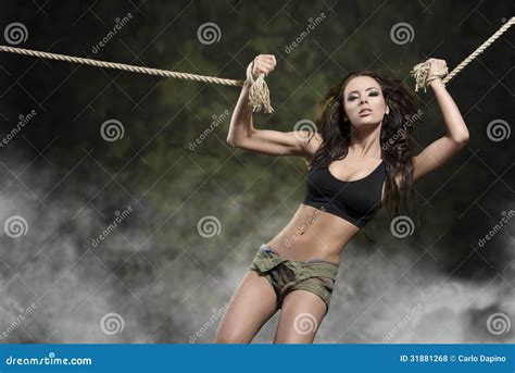Girl Tied By Rope On Militry Background Stock Photo Image Of Beauty