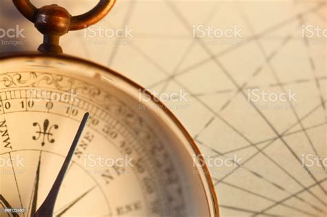 Antique Compass On Old Map With Gridlines Stock Photo Download Image