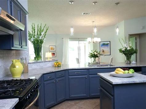 It works well with silver or black accents and can be paired with both cool or warm wall colors. Image result for dark blue cabinets kitchen | Dark blue kitchens, Blue countertops, Blue kitchen ...