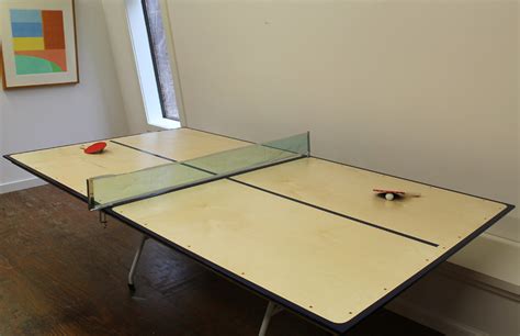 It would be badass to make a ping pong table that could fold up or dismantle into 1/4 the space. Art and Home: Building a Ping Pong table