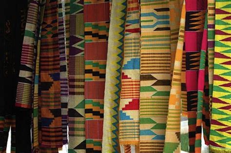 How Kente Cloth Became A Worldwide Phenomenon God Bless Us All Embroidered Robes Kente Cloth