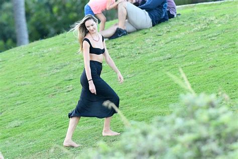 candice swanepoel flashes her panties and flaunts slender legs at the park in miami 38 photos