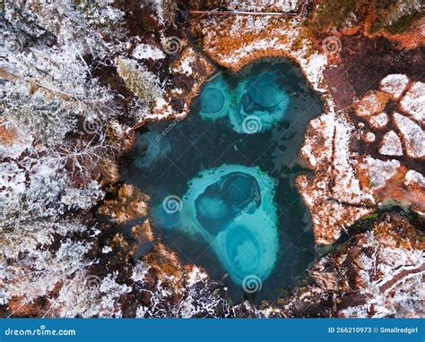 Blue Geyser Lake In Autumn Forest After Snowfall Altai Mountains