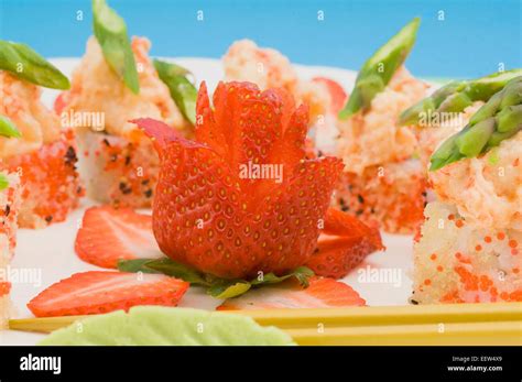 Spicy Scallops Sushi Rolls With Strawberries Garnish Stock Photo Alamy