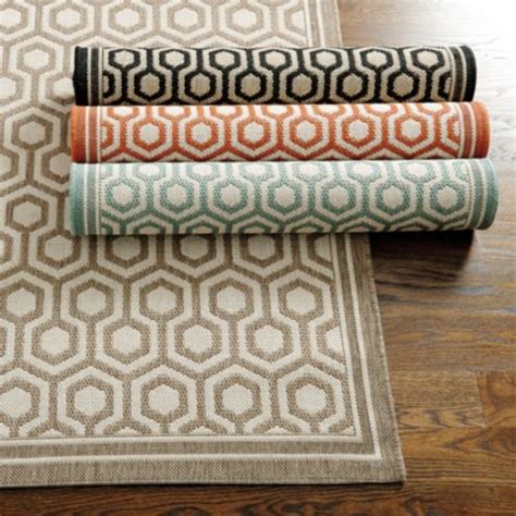 These outdoor rugs are available in a beautifulthese outdoor rugs are available in a beautiful array of patterns and colors constructed from 100% polypropylene fiber to ensure resistance from stain, soil and sun. Honeycomb Indoor/Outdoor Rug | Ballard Designs