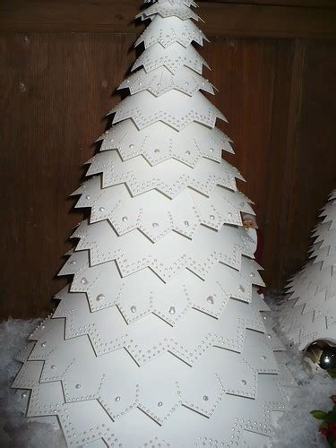White Christmas Trees Made Of Layers Of Stiff Paper And Gl Flickr