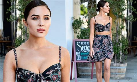Olivia Culpo Shows Off Her Toned Tummy In A Flowing Two Piece After