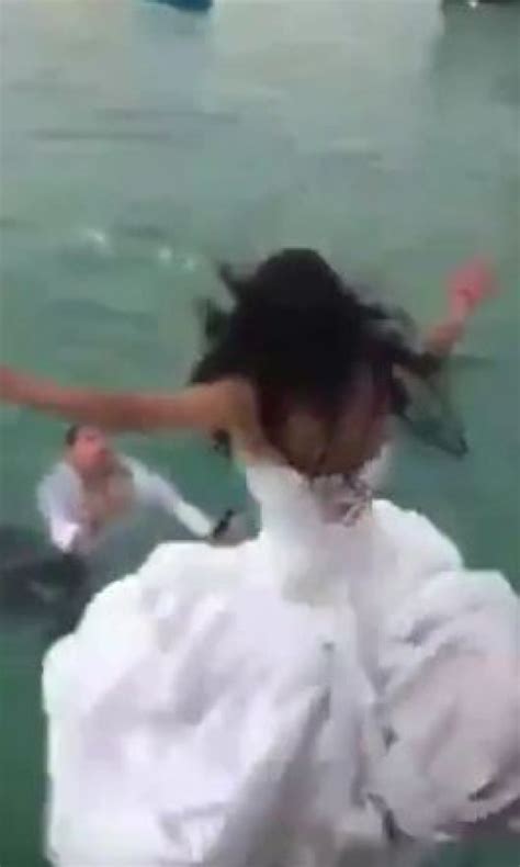 Bride Nearly Drowns After Jumping Into The Sea In Wedding Trash The Dress Stunt Metro News