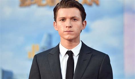 Tom holland is a british actor whose starred in an array of films such. Tom Holland Reveals Tipsy Phone Call Saved Spider-Man From ...