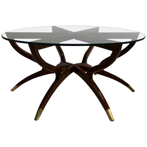 A simple and modern glass collapsible coffee table. Mid-Century Modern Collapsible Spider Leg Coffee Table For ...