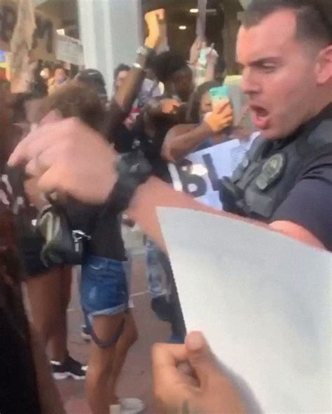 After A Cop Pushed A Kneeling Woman Black Female Police Officer Stands Up For Her Laptrinhx