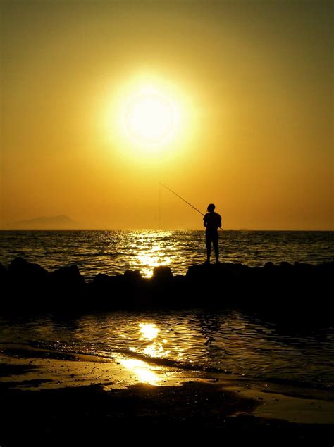 Fisherman At Sunsetpescatore Al Tramonto On The Beach Of Flickr
