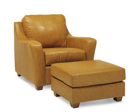 Butterscotch colored leather chair with matching ottoman | Vintage
