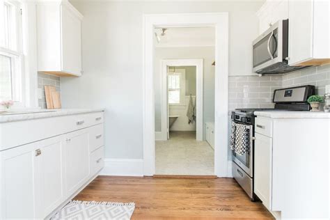 On the website, lowe's says the box is made of furniture board which i think is a fancier way of saying particle board (it's not plywood). Lowe's Stock Cabinets Review | Diamond Now Arcadia White Shaker Cabinets — Elizabeth Burns ...