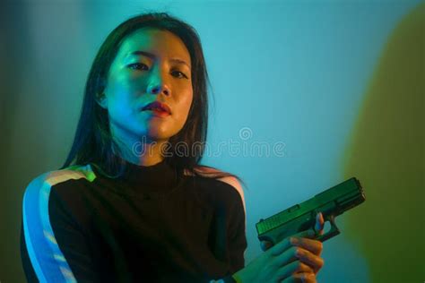 Beautiful Sexy Chinese Girl Holding Gun Stock Photos Free And Royalty