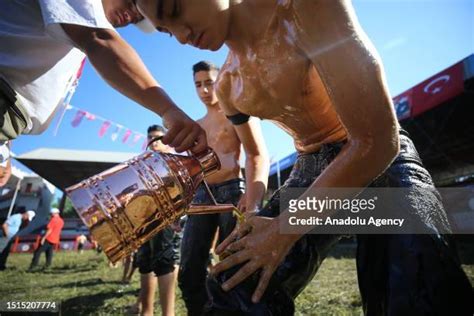 Oiled Bodies Photos And Premium High Res Pictures Getty Images