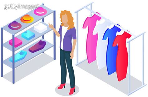 Customer Choosing Clothes In Store Shop Assistant Helps Buyer To Choose Product During Shopping