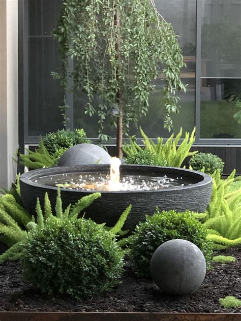 We have a great range of garden water features for sale online. Water bowl bubbler feature with 30cm stone ball#30cm #ball ...