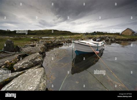 Boat Tied To The Shore Stock Photo Alamy