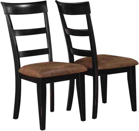 A caned seat and crossed back with visible metal joinery just nail it. Black Wood Dining Chairs - Home Furniture Design