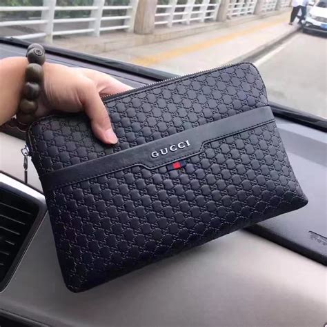 Men on the continent are considered to be more effete than british men and more. Gucci 9072 Signature Men Clutch Bag Black